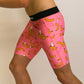 Side view of the pink banana half tights.