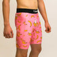Side view of the men's 8 inch pink bananas half tights from ChicknLegs.