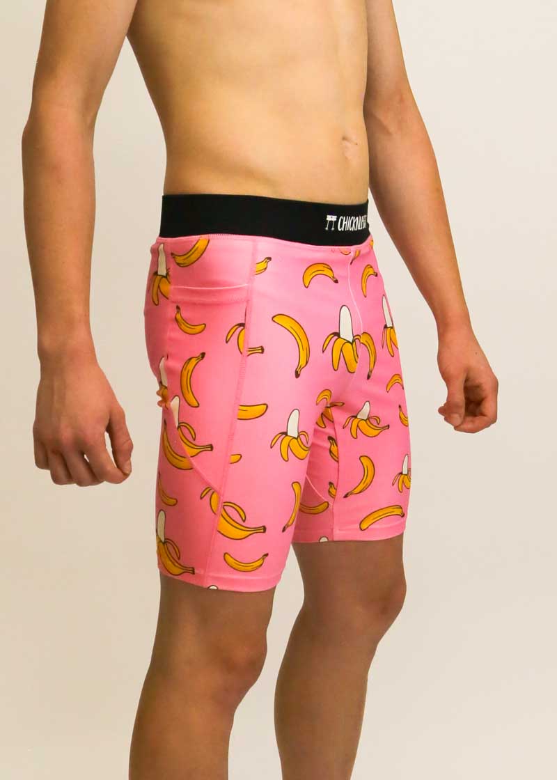 Side view of the men's 8 inch pink bananas half tights from ChicknLegs.