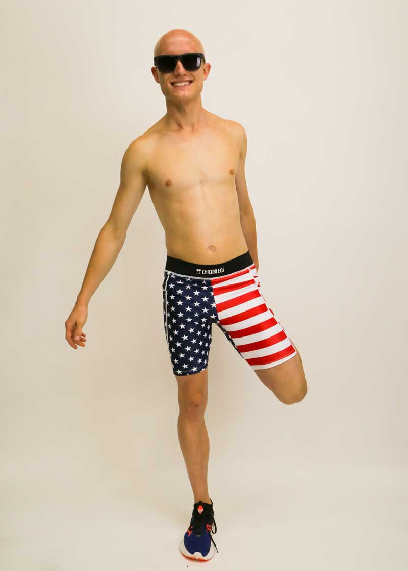 Runner stretching while wearing the 8 inch USA half tights.