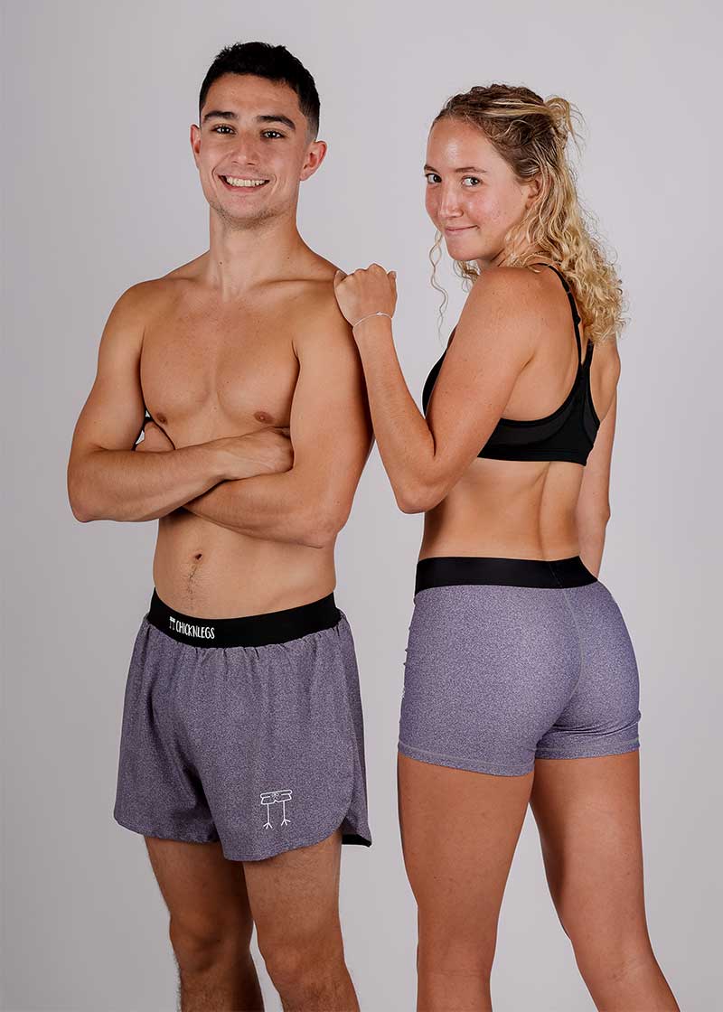 Group picture of the heather grey design in both the women's 3 inch compression shorts and the men's 4 inch half split running shorts.