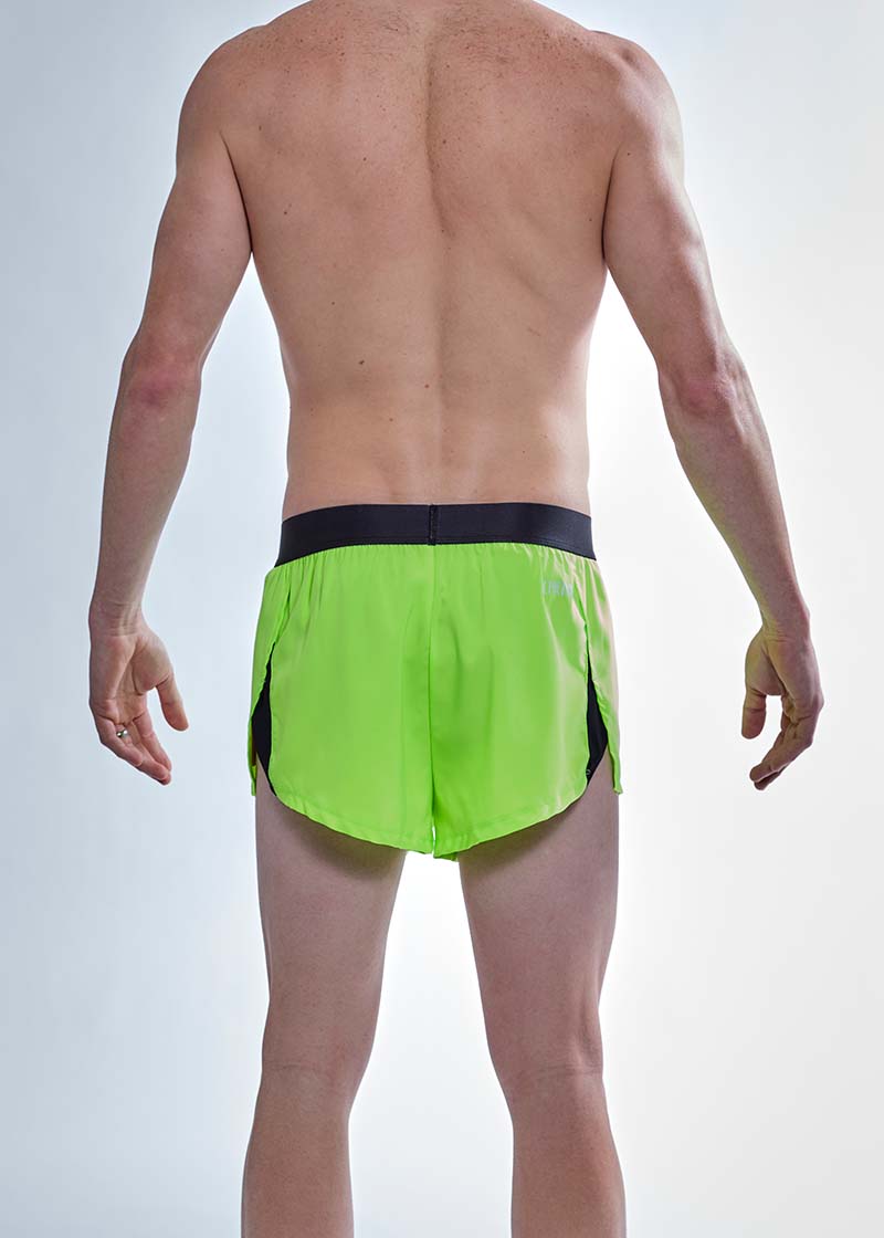Rear view of the ChicknLegs men's 2 inch neon green split running shorts.