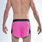 Rear closeup view of the men's neon pink 2 inch split running shorts.