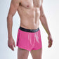 Side closeup view of the men's neon pink 2 inch split running shorts.