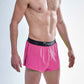 Side closeup view of the men's neon pink 2 inch split running shorts.