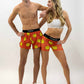 Group photo of the men's and women's smiley face running shorts from ChicknLegs.