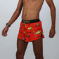 Closeup left side view of the men's 2 inch cars split running shorts.