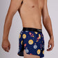 Side view of the ChicknLegs men's cryptocurrency 2 inch split running shorts.