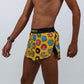 Side view showing the logo of the men's salty donuts 2" split running shorts from ChicknLegs.