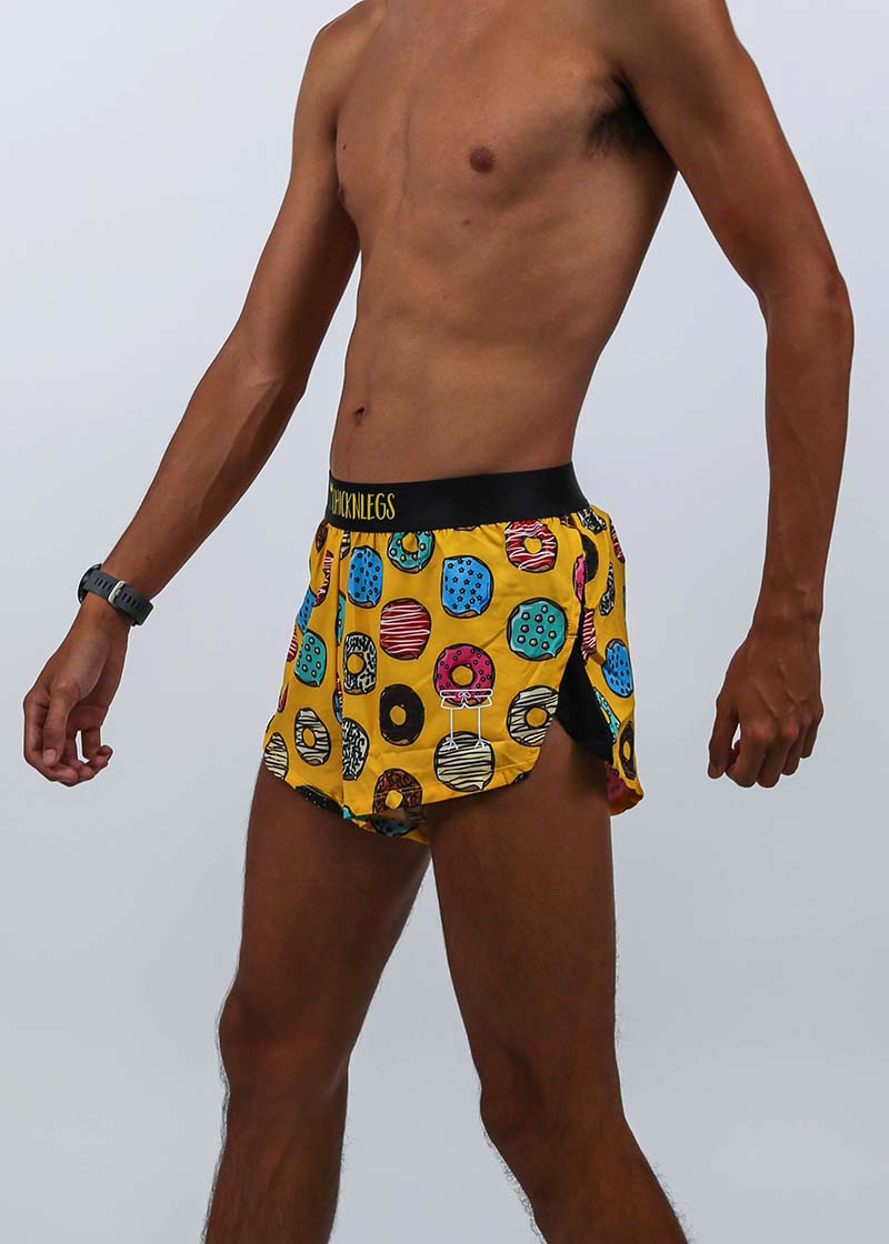 Side view showing the logo of the men's salty donuts 2" split running shorts from ChicknLegs.