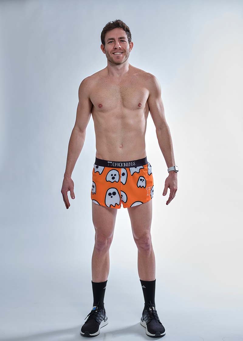 Full body view of the ChicknLegs men's 2 inch ghosts split running shorts.