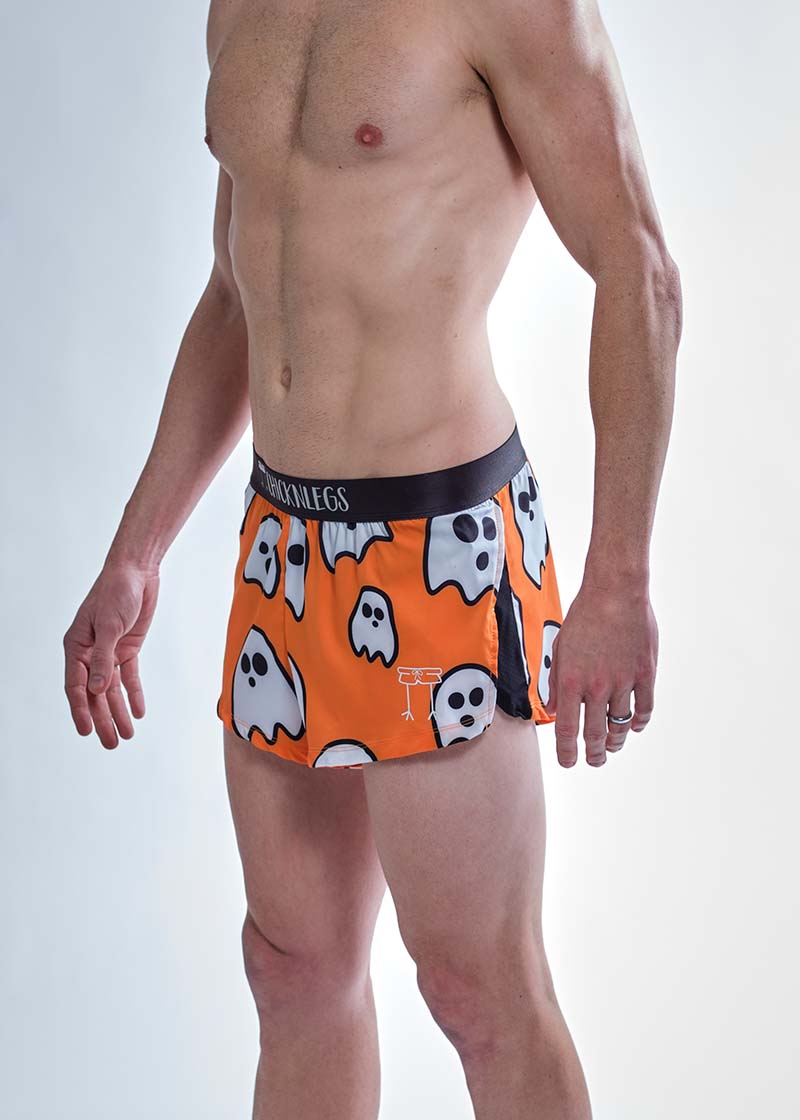 Side logo view of the ChicknLegs men's 2 inch ghosts split running shorts.