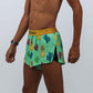 Closeup side view of the logo and split on the men's 2 inch green llama running shorts.