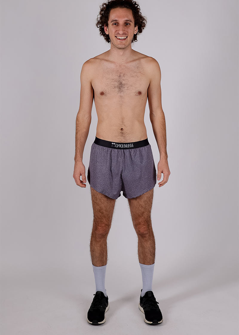 Full body view of the ChicknLegs men's heather grey 2 inch split running shorts.