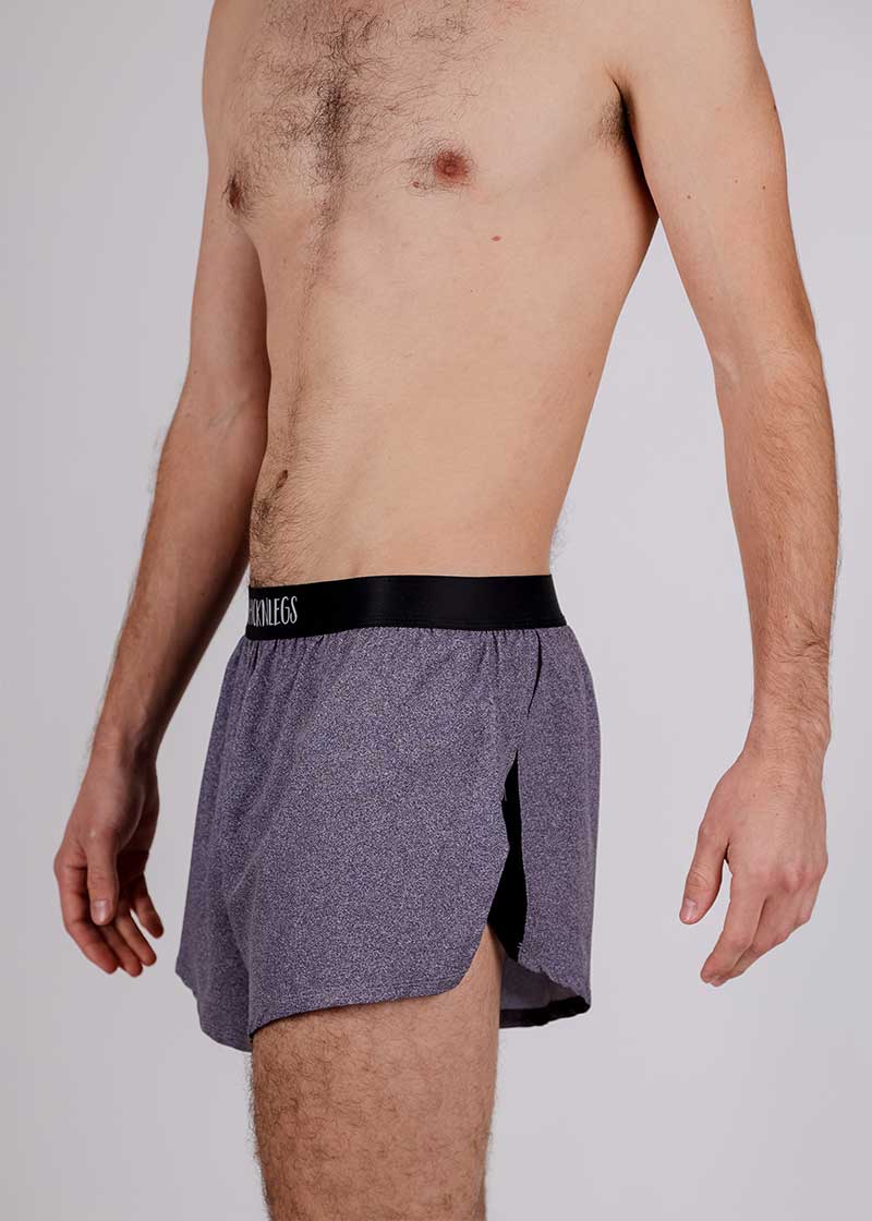 Logo side closeup view of the ChicknLegs men's heather grey 2 inch split running shorts.