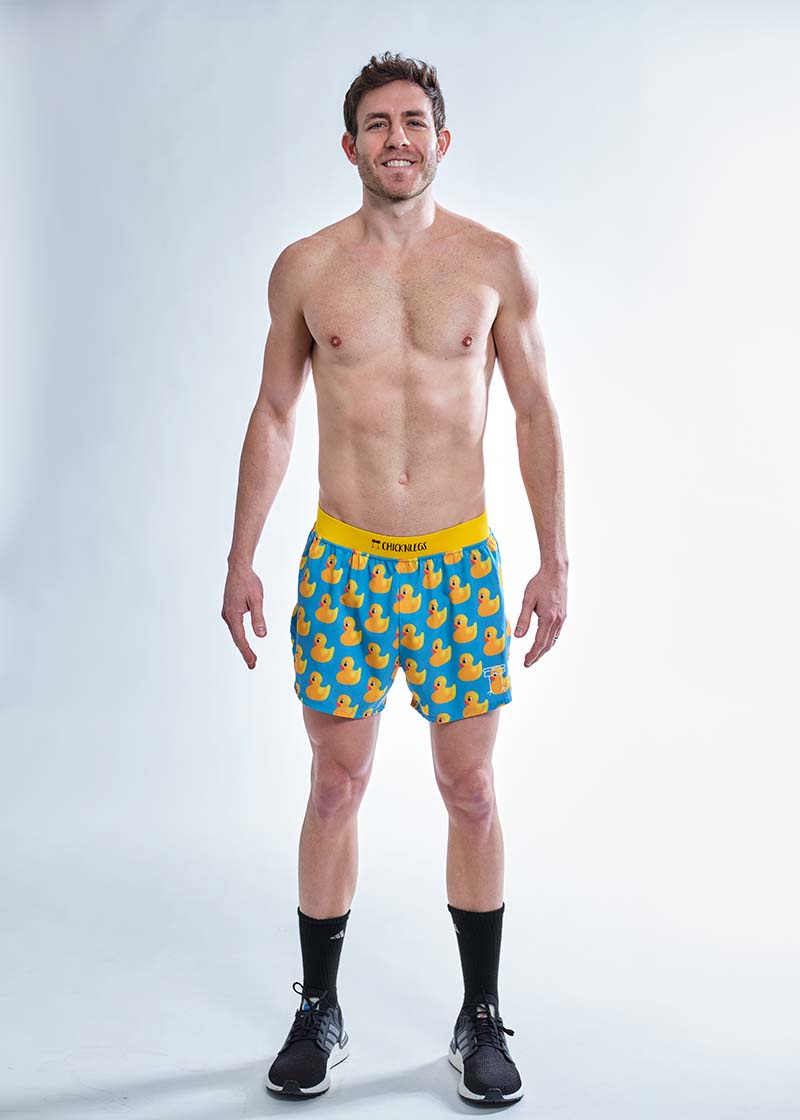 Full body shot of the men's 4 inch rubber ducky running shorts.