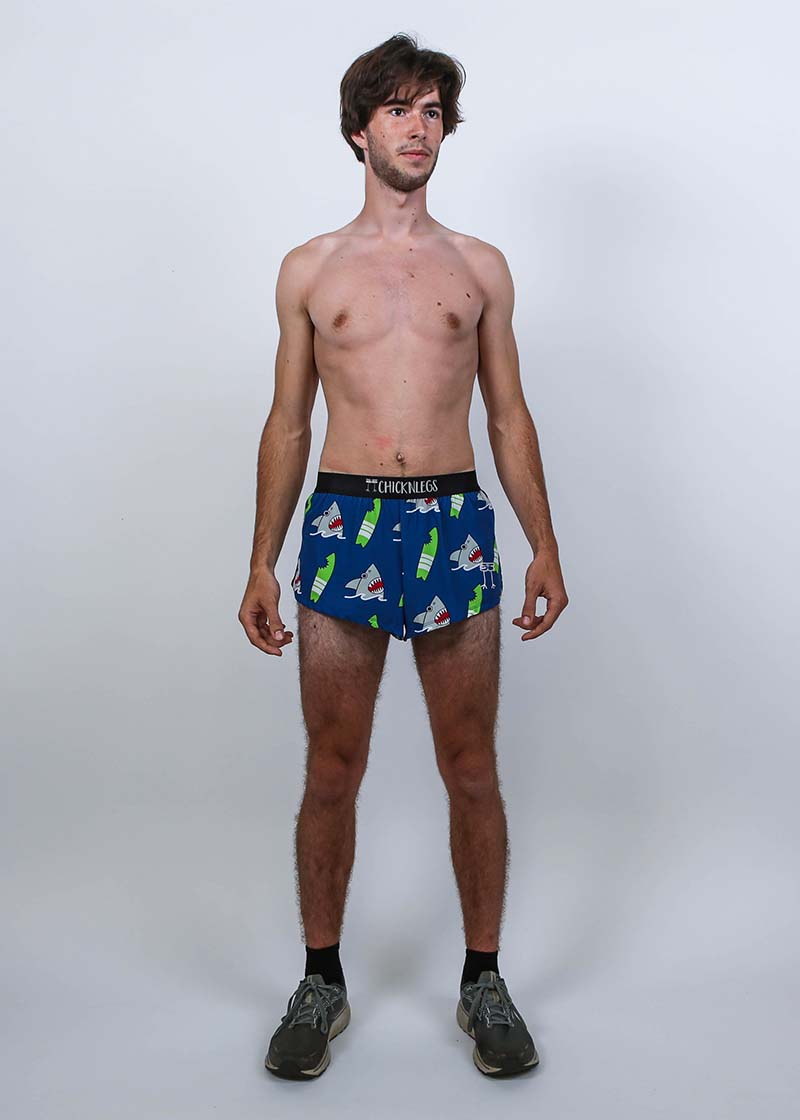 Full body view of the men's 2 inch shark running shorts.