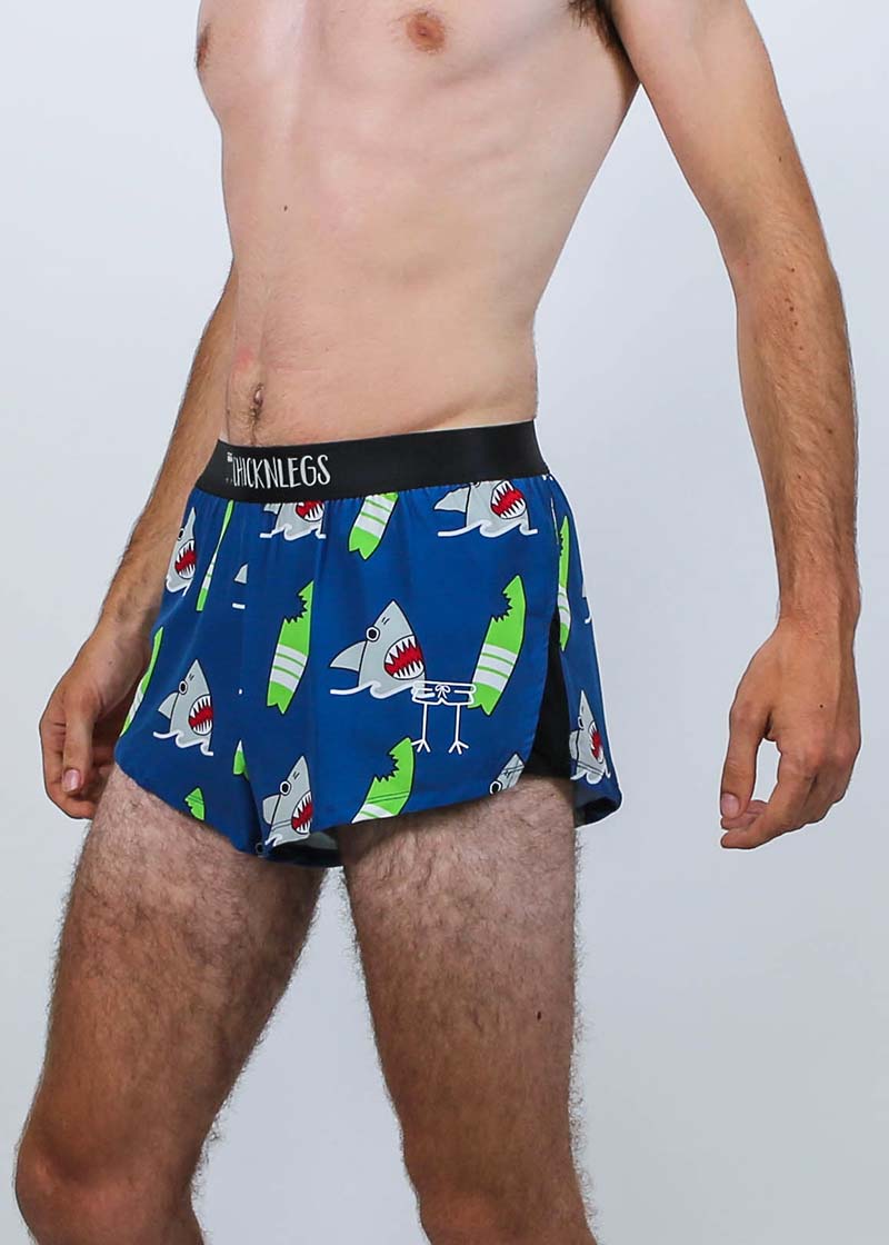 Closeup side view of the men's 2 inch shark running shorts.