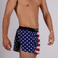 Side view of the men's USA 2 inch split running shorts showing the split and side mesh paneling.