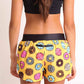 ChicknLegs women's donuts 1.5" split running shorts back view with zipper pocket..