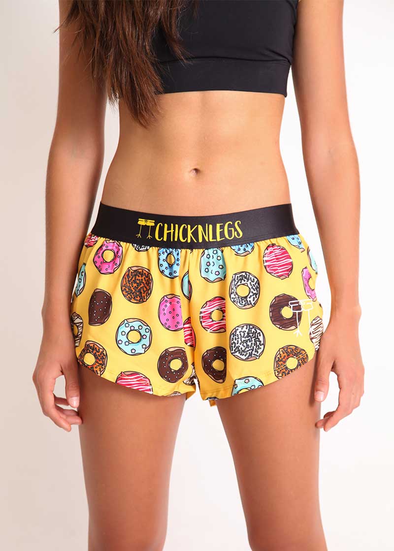 ChicknLegs women's donuts 1.5" split running shorts front view closeup.