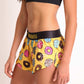 ChicknLegs women's donuts 1.5" split running shorts side view with logo.