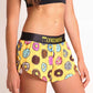 ChicknLegs women's donuts 1.5" split running shorts side view.