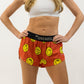 Front closeup view of the women's smiley face running shorts from ChicknLegs.