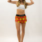Full body photo showing runner wearing the smiley face running shorts.