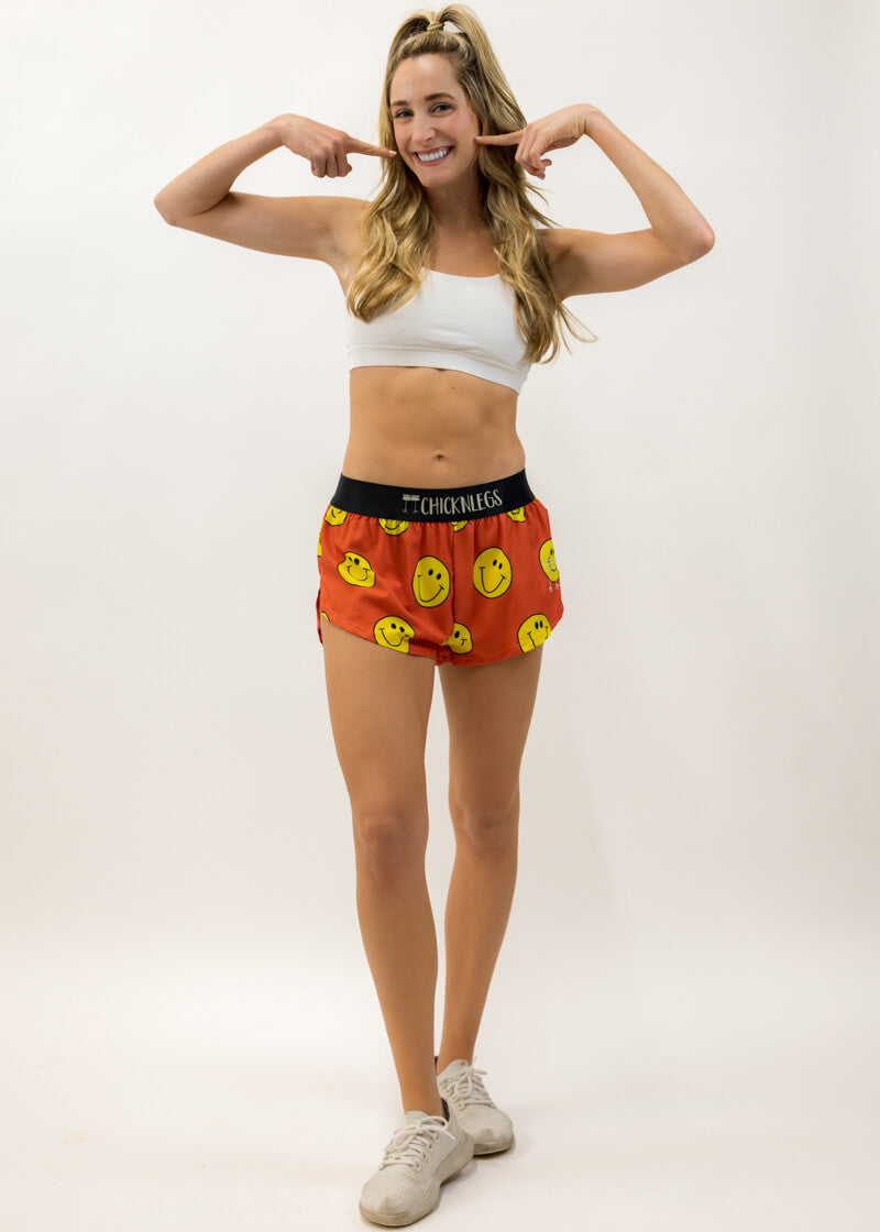 Full body photo showing runner wearing the smiley face running shorts.