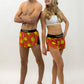 Group photo of runners wearing the men's and women's smiley face running shorts from ChicknLegs.