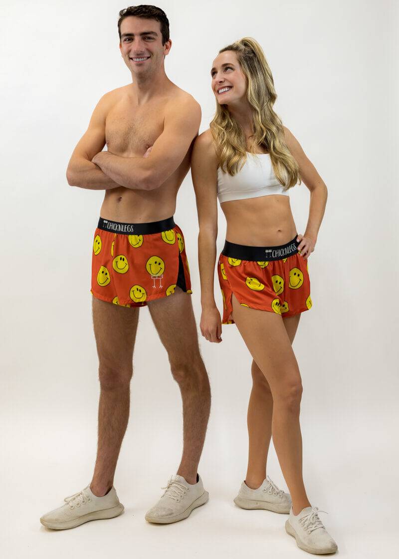 Group photo of runners wearing the men's and women's smiley face running shorts from ChicknLegs.