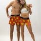 Group photo of the men's and women's smiley face running shorts.