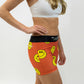 Right side view of the women's smiley face 3 inch compression running shorts from ChicknLegs.
