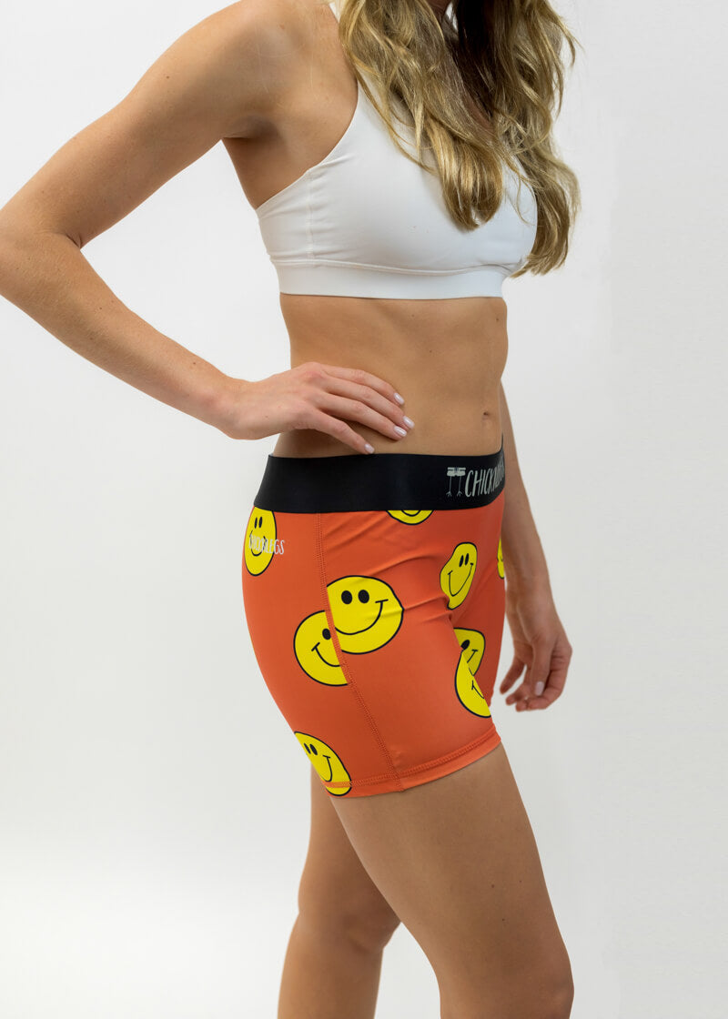Right side view of the women's smiley face 3 inch compression running shorts from ChicknLegs.