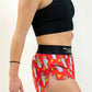 Right side view of the women's 1.5 inch burritos split running shorts from ChicknLegs.
