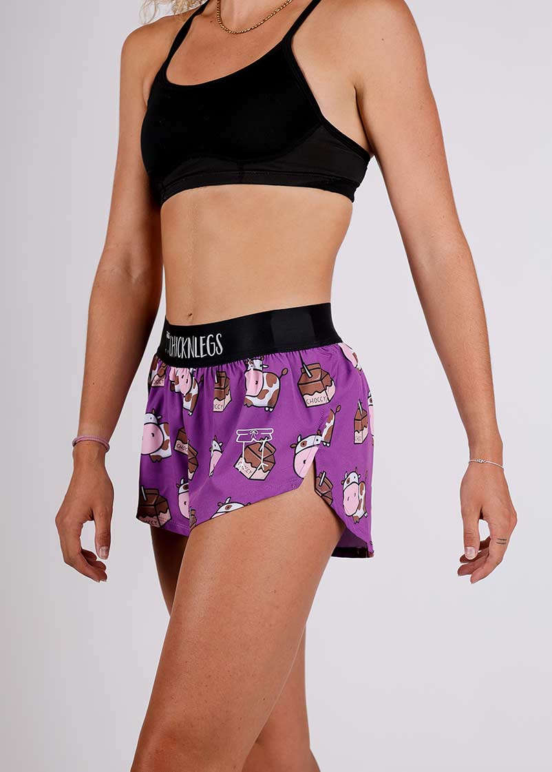 ChicknLegs women's choccy cows chocolate milk 1.5" split running shorts front view of the logo.