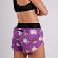 ChicknLegs women's choccy cows chocolate milk 1.5" split running shorts rear closeup view.