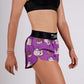 ChicknLegs women's choccy cows chocolate milk 1.5" split running shorts side closeup view.