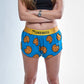 Front closeup view of the chicknlegs women's 1.5" split running shorts.