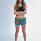 Full body view of the chicknlegs women's 1.5" split running shorts.