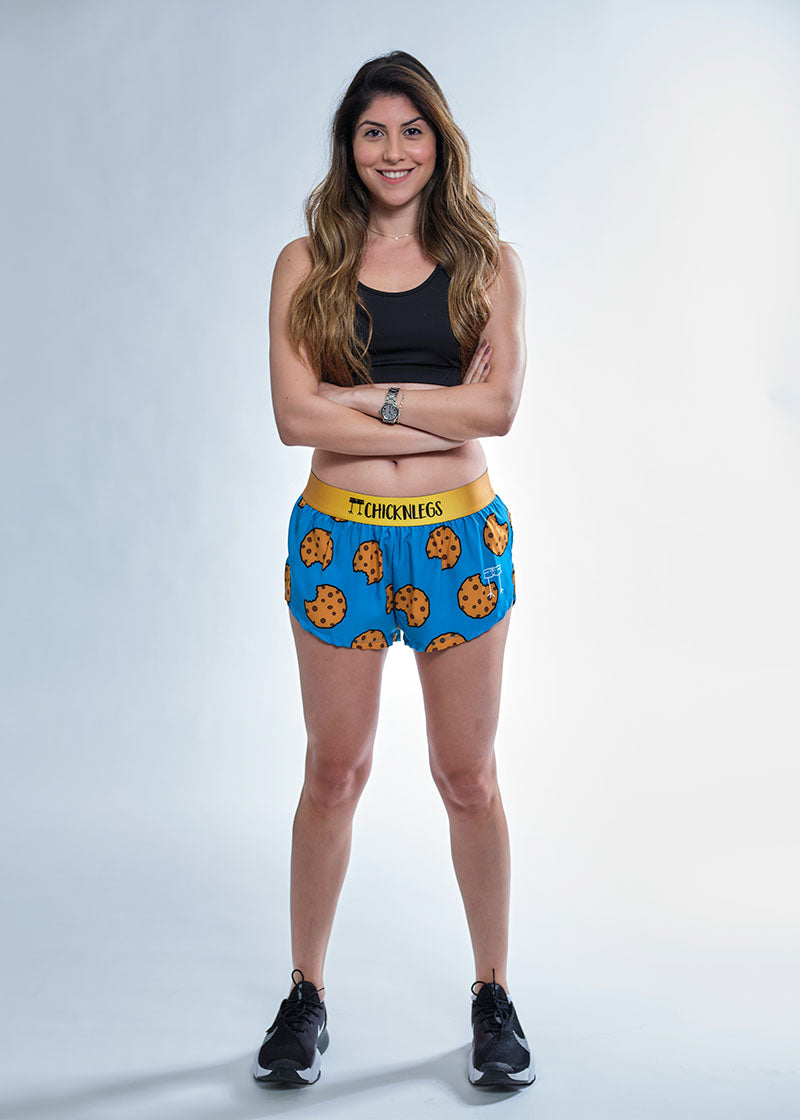 Full body view of the chicknlegs women's 1.5" split running shorts.