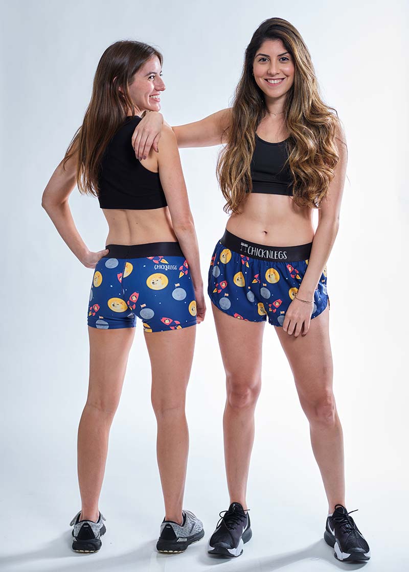 Full body group photo of the ChicknLegs Crypto compression and split running shorts.