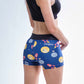 Rear view of the ChicknLegs women's crypto 3 inch compression running shorts.