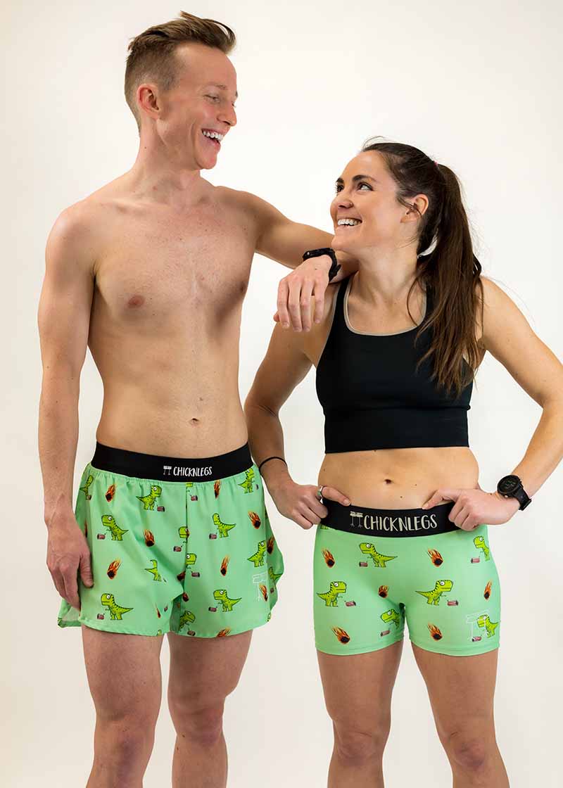 Group photo of the men's and women's dino-sore running shorts from ChicknLegs.