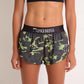 ChicknLegs women's green camo 1.5" split running shorts front view.