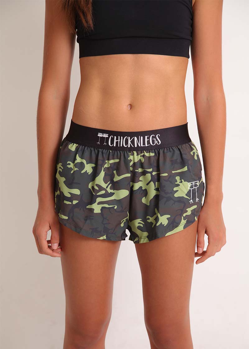 ChicknLegs women's green camo 1.5" split running shorts front view.
