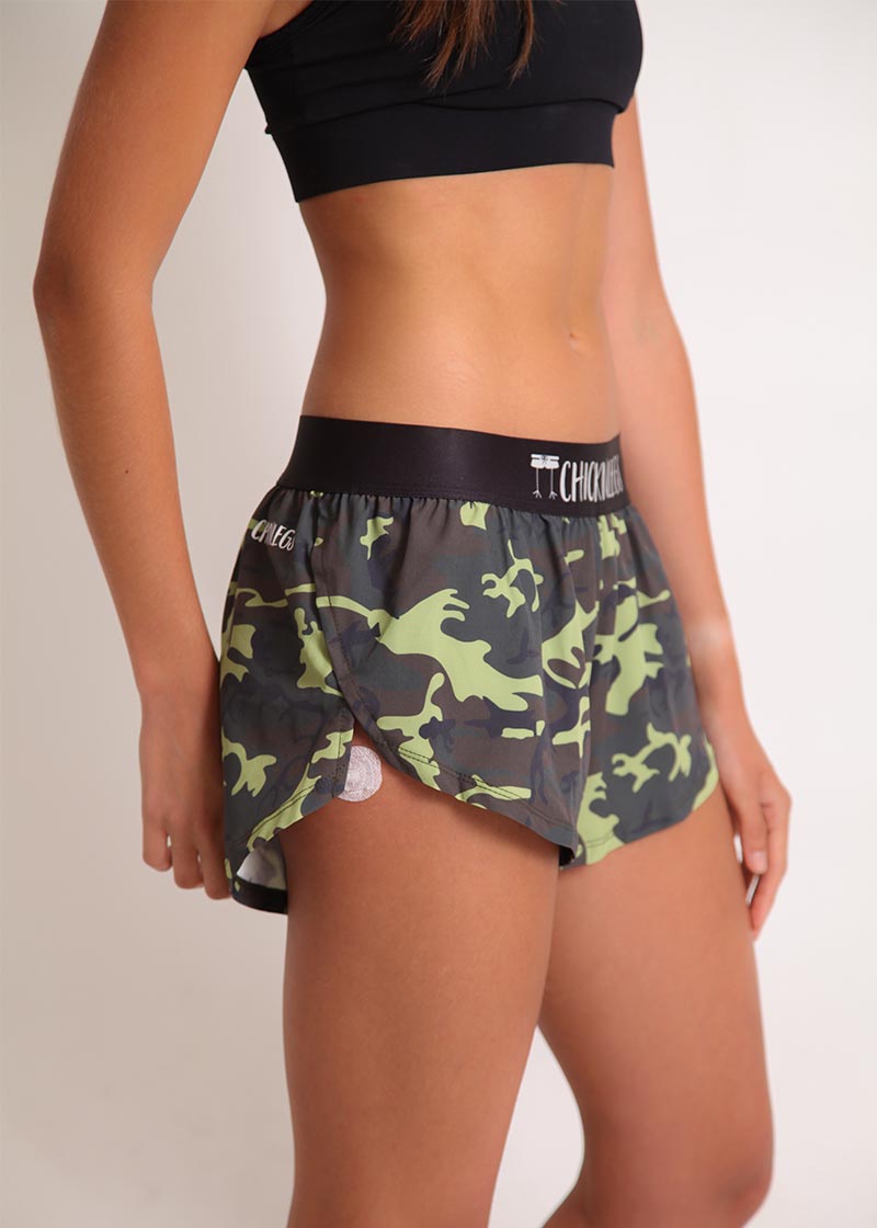 ChicknLegs women's green camo 1.5" split running shorts side view.