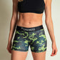 ChicknLegs women's green camo 3 inch compression running shorts front view.