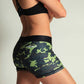 ChicknLegs women's green camo 3 inch compression running shorts side view.
